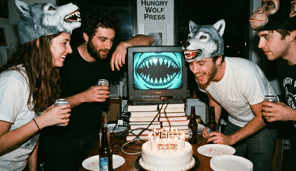 Kerouac failing miserably to blow out the candles of its own birthday cake at a Hungry Wolf Press staff party back in the day when none of us still existed.